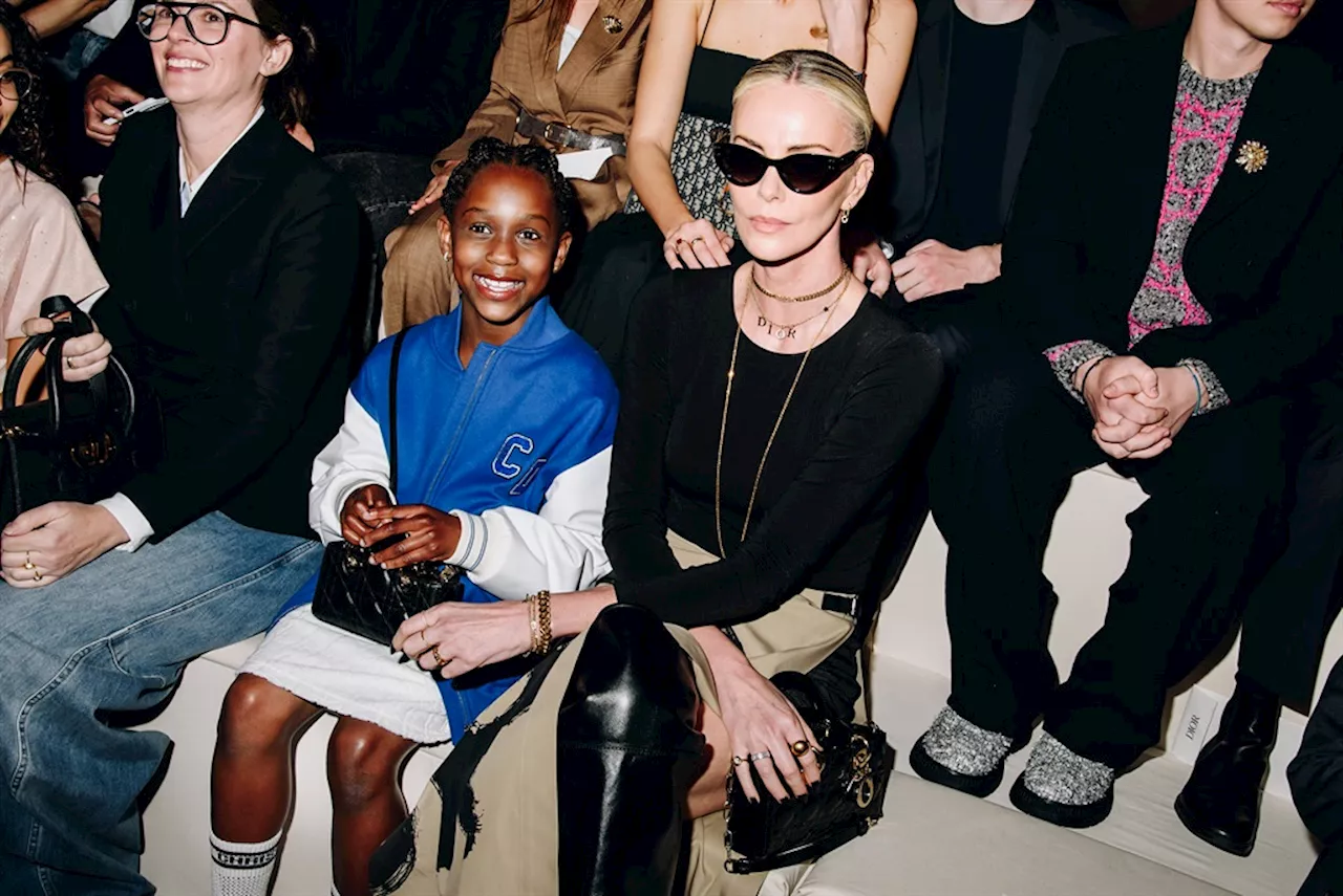  Charlize Theron and daughter August shine in rare public appearance at Dior fashion show