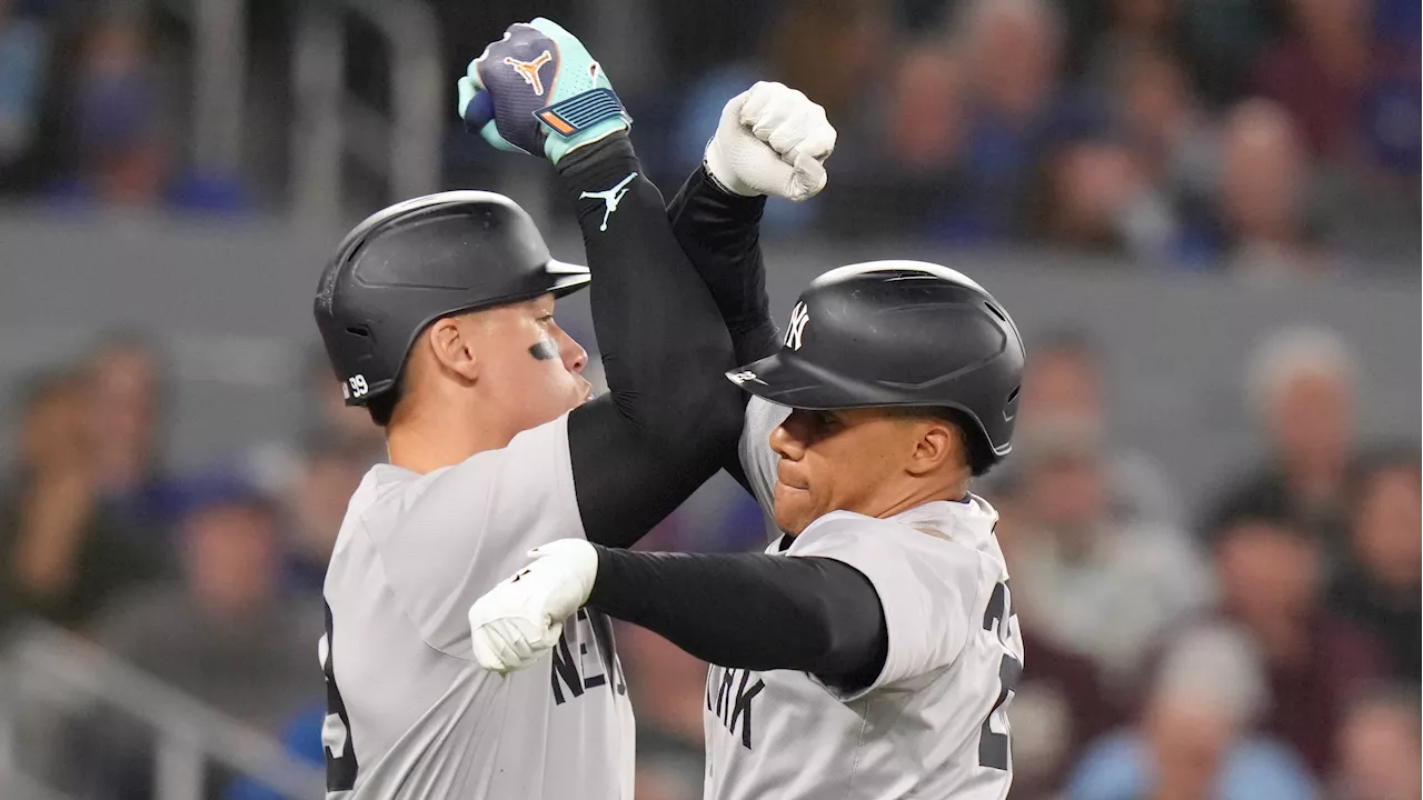 Stanton homers, Judge drives in pair in ninth as Yankees come back to beat Jays