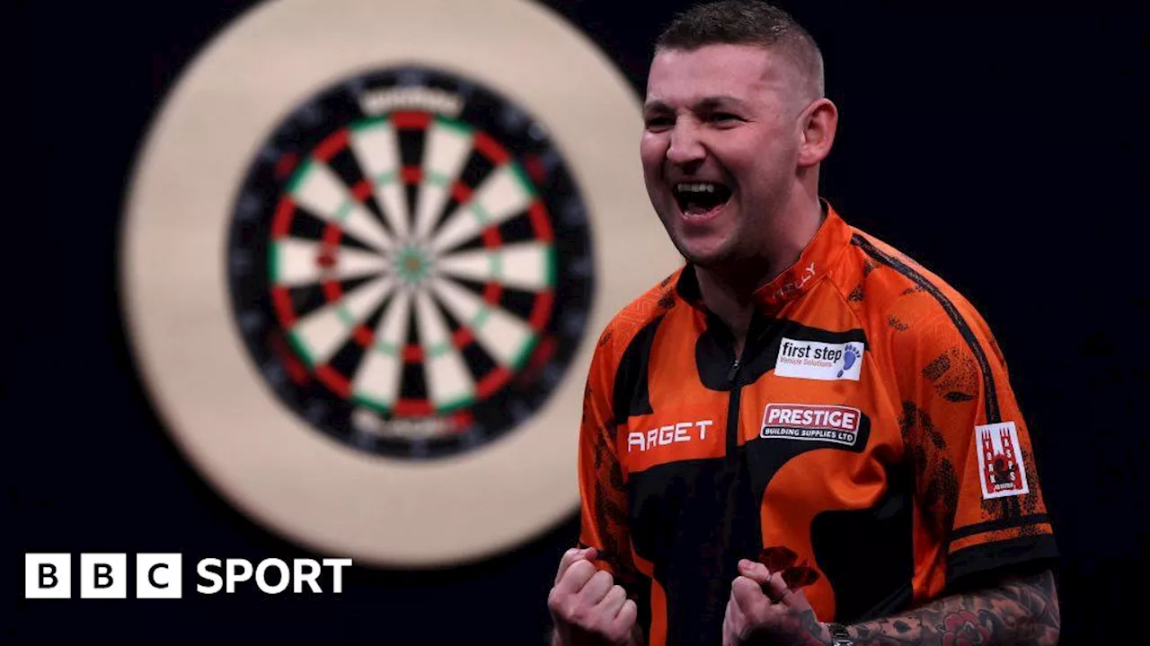 Premier League Darts: Nathan Aspinall beats Michael Smith to win night 12 in Rotterdam