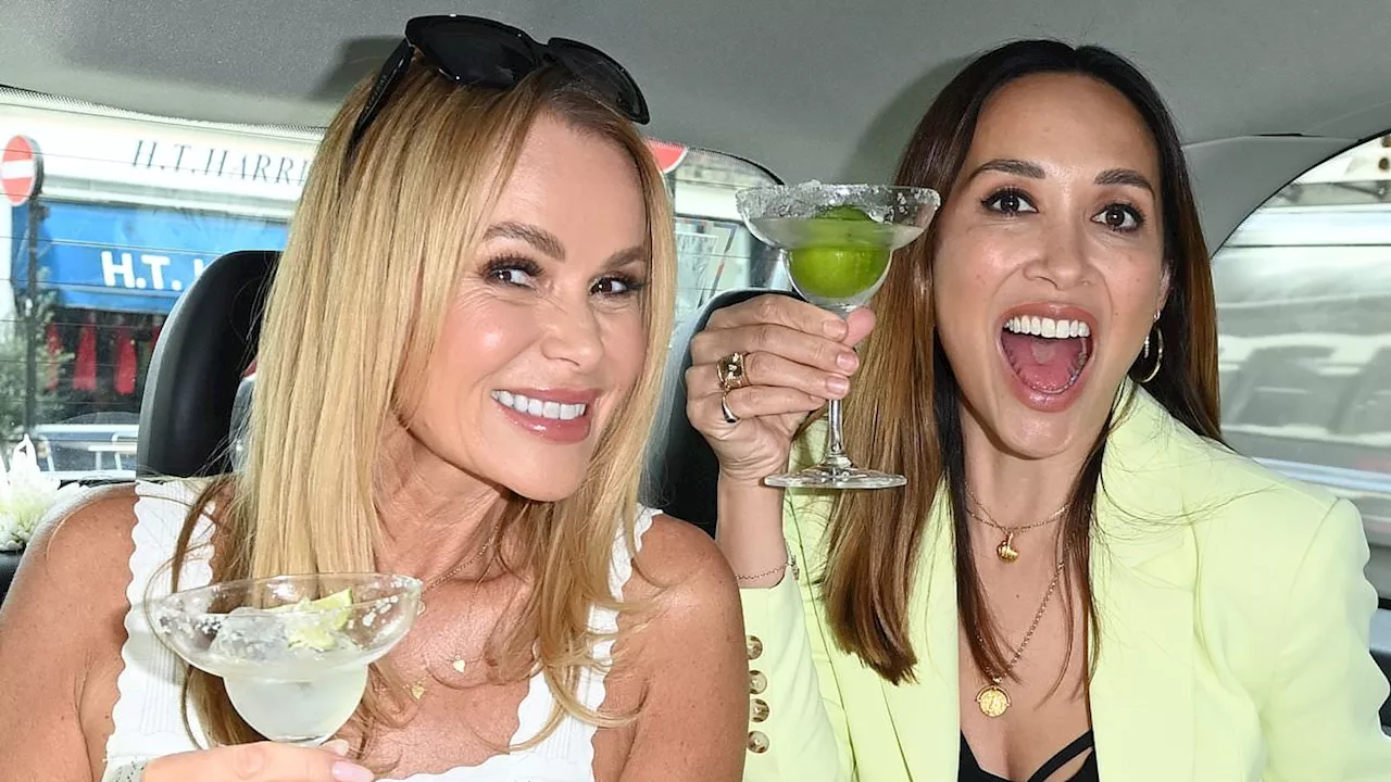 Amanda Holden drinks margaritas and wildly sprays champagne all over her friend Myleene Klass as she...