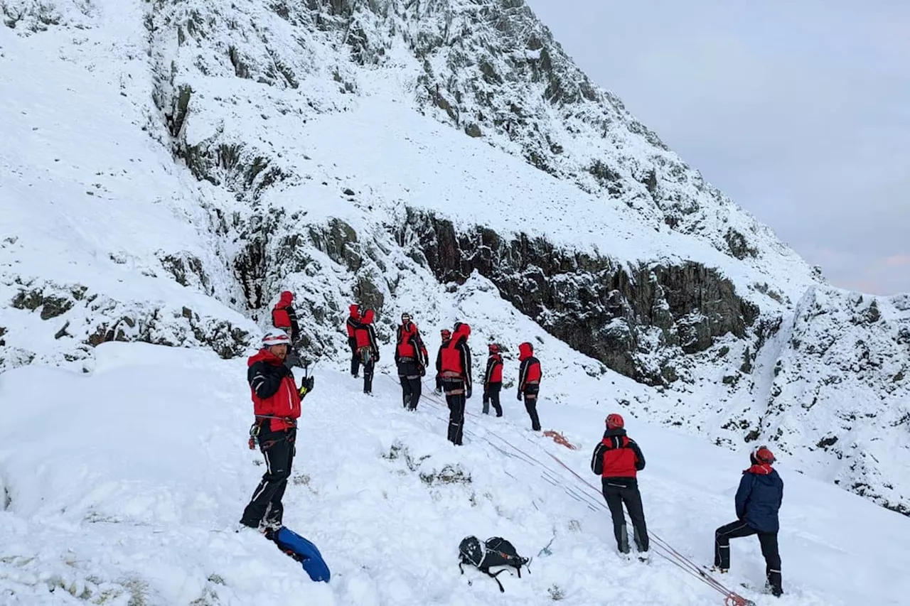 Watch dramatic rescue after teen plunges down 30ft high waterfall on mountain