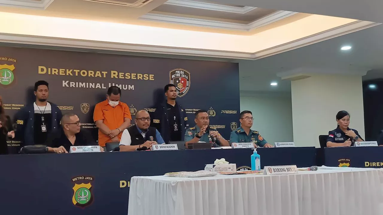 Potret Pengemudi Fortuner Arogan Tersangka Pelat Dinas TNI Palsu Pakai Baju Tahanan