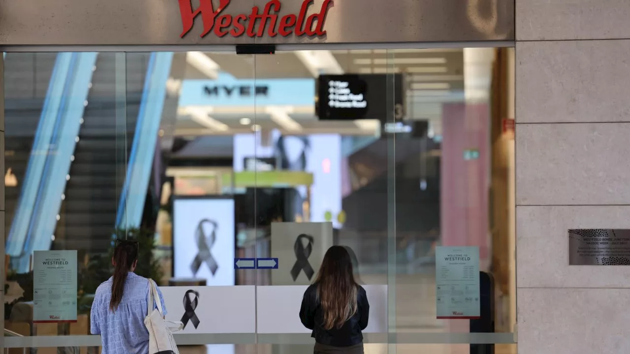 Mourners gather at Westfield Bondi Junction as reflection day gets underway