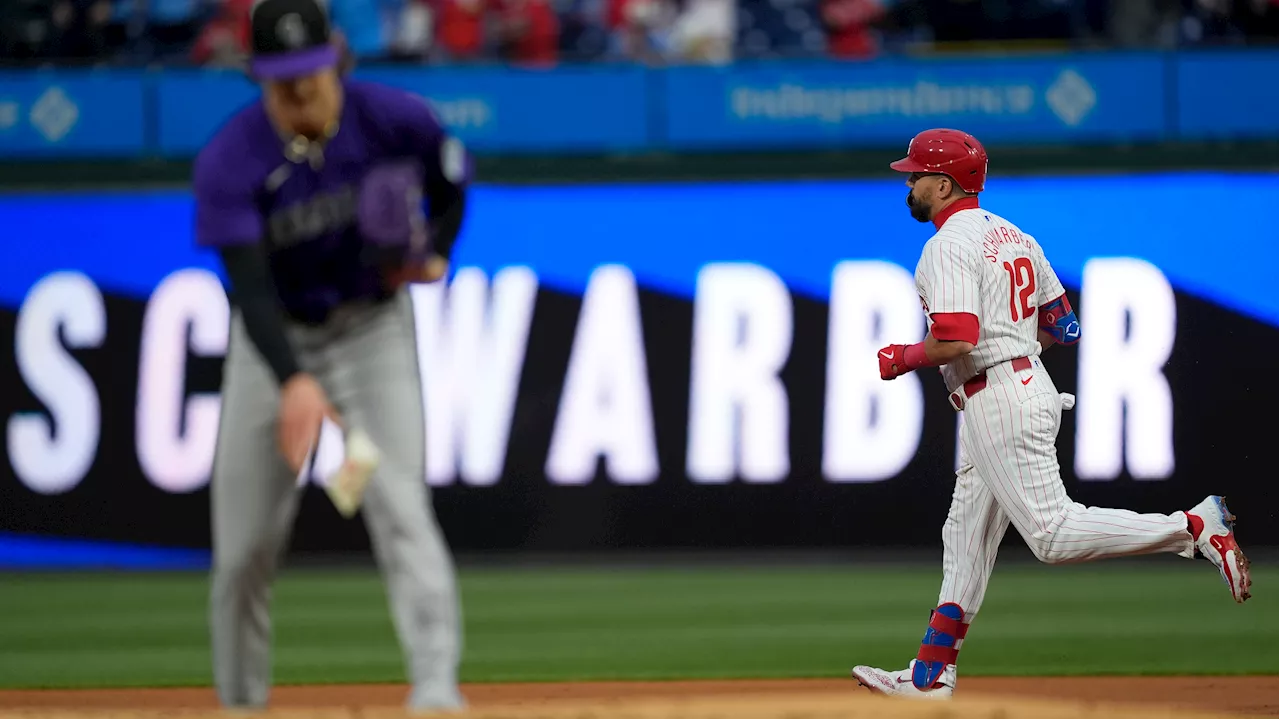 Schwarber homers twice as Phillies finish sweep of Rockies