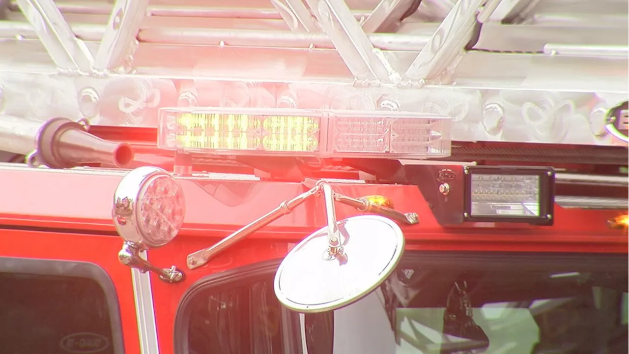 Dramatic video shows man climbing three stories to rescue neighbor from raging house fire