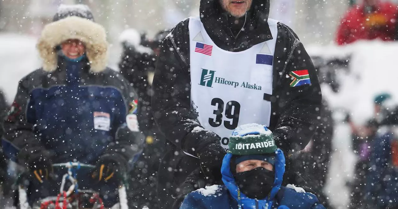 6 Iditarod mushers taken off the trail Friday during a powerful storm in the White Mountain area