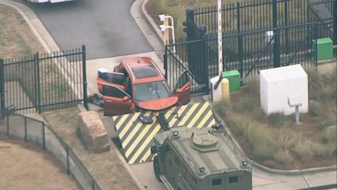 Driver rams into front gate of Atlanta FBI office, taken into custody