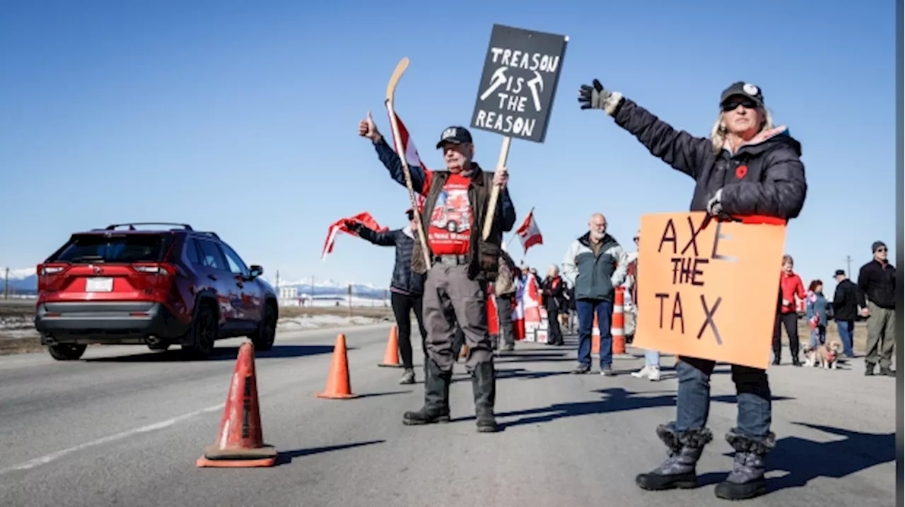 'It just needs to stop': Carbon price protesters slow traffic on Trans-Canada Highway