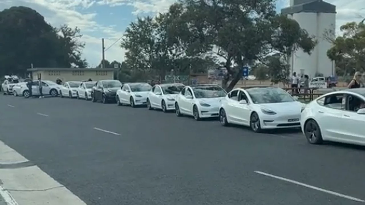 Single picture of queuing Teslas perfectly illustrates the problem Australia will face ditching...