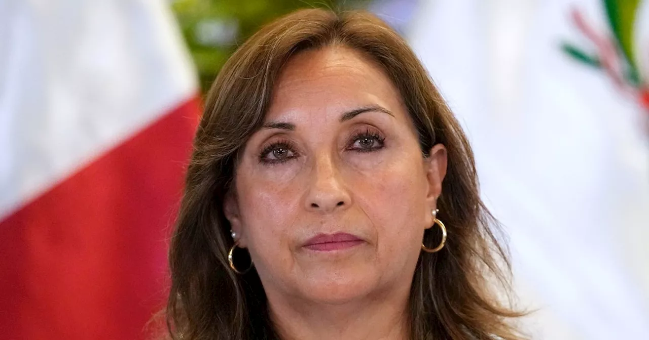 Peru's president replaces 6 ministers as she battles scandal over luxury watches