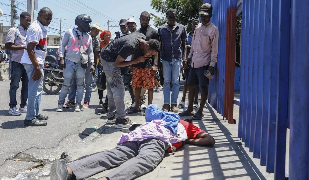 Gunfight between Haitian police and gangs paralyzes area near National Palace