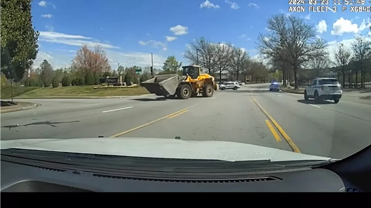 Video shows man on stolen front loader leading police on 5-mile chase in Georgia