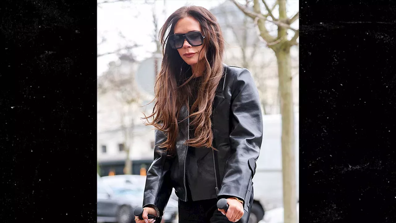 Victoria Beckham Forced to Use Crutches During Paris Fashion Week ...