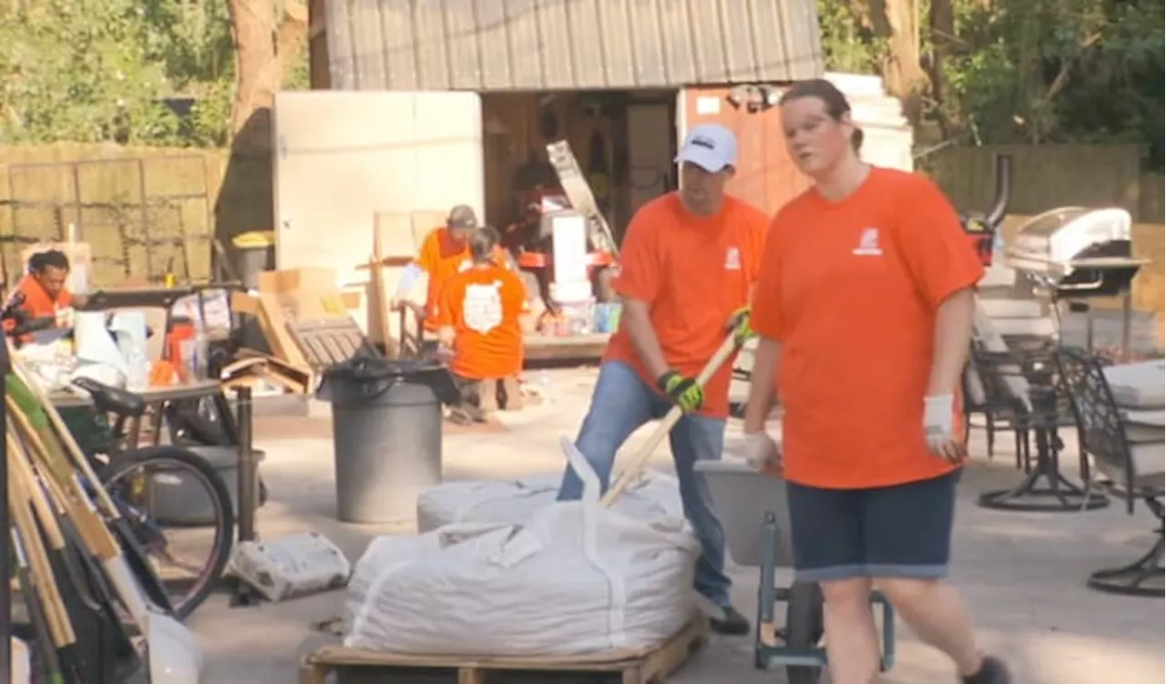 Volunteers come together to beautify transitional housing center for veterans experiencing homelessness