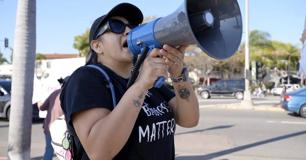 Healthcare workers protest maternity ward closure outside Scripps Health event