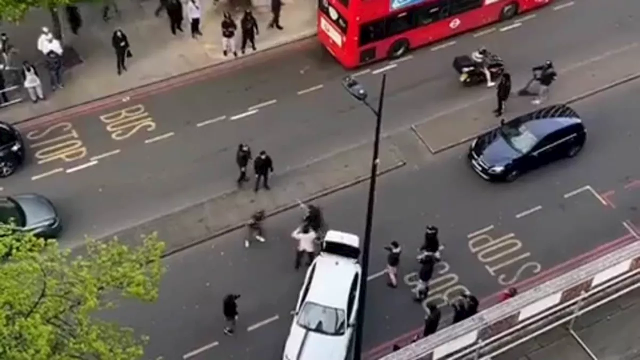 Shocking footage shows men brawling with machetes on London road