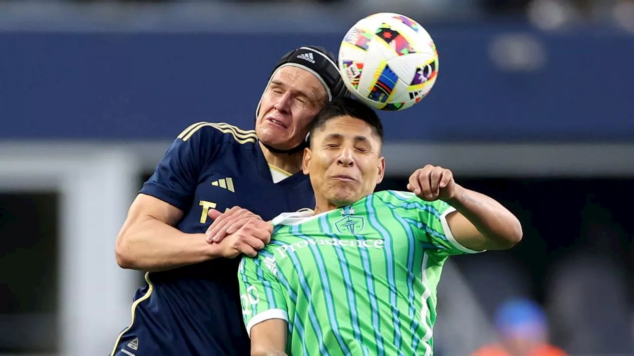 Two red cards doom Seattle Sounders in 2-0 loss to Whitecaps