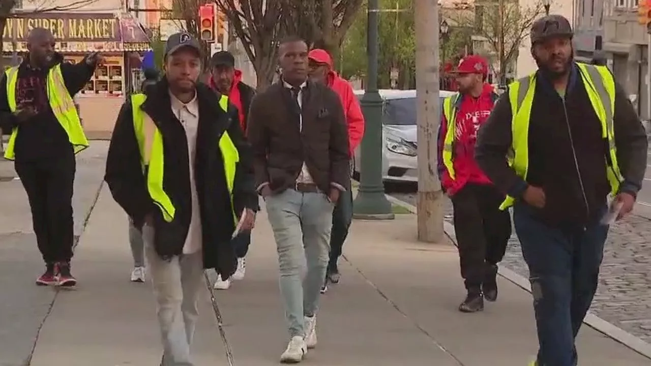 Men gather in Operation Hug the Block in Germantown with goal to reduce violence