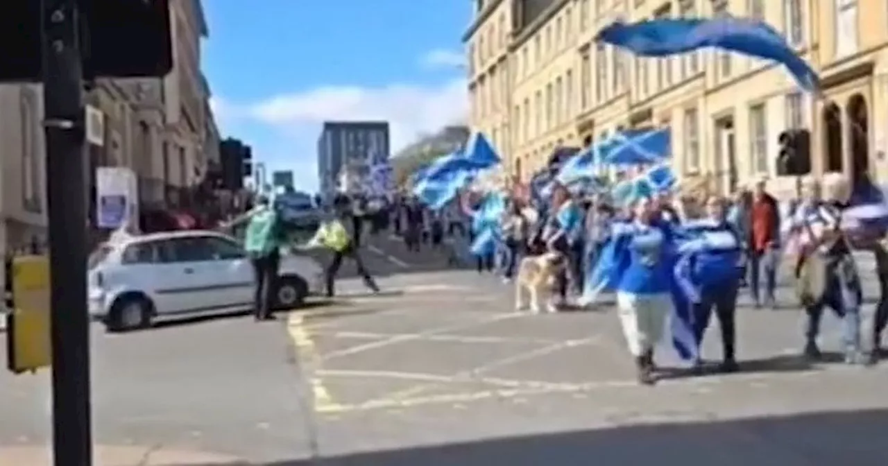 Glasgow independence march horror as cop stopped car before it 'ploughed into crowd'