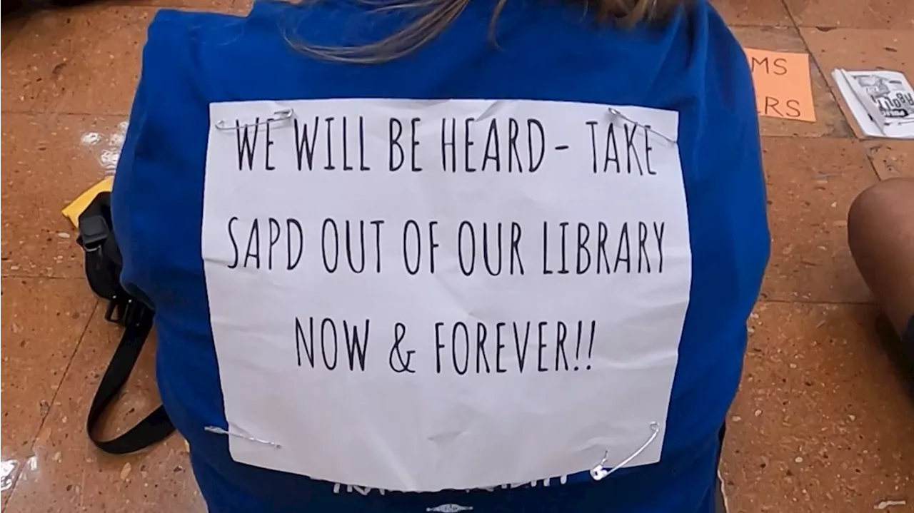 Activist protest pilot program that puts armed SAPD officers at San Antonio Central Library