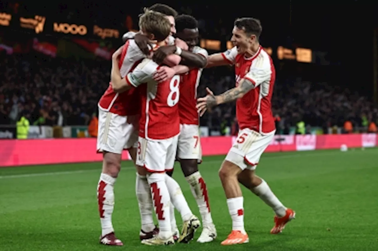 ‘Back to business’ Arsenal grind out Wolves win to go top