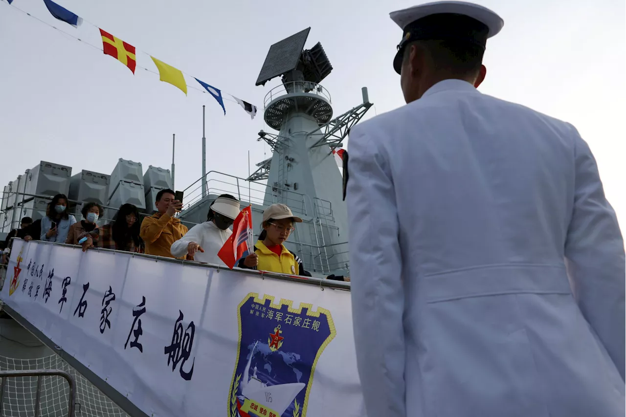 China hosts foreign naval officials amid South China Sea tensions