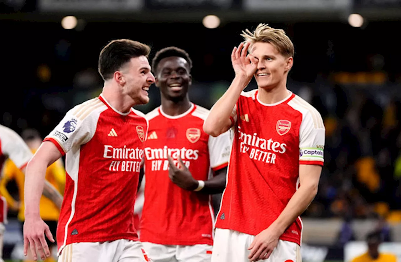 Arsenal return to top of Premier League with win at Wolves