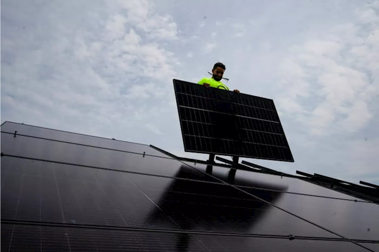 Biden is marking Earth Day by announcing $7 billion in federal solar power grants