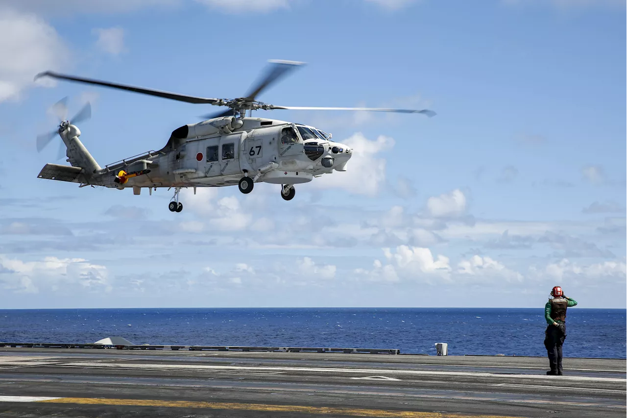 Japan Navy Helicopters Crash in Pacific