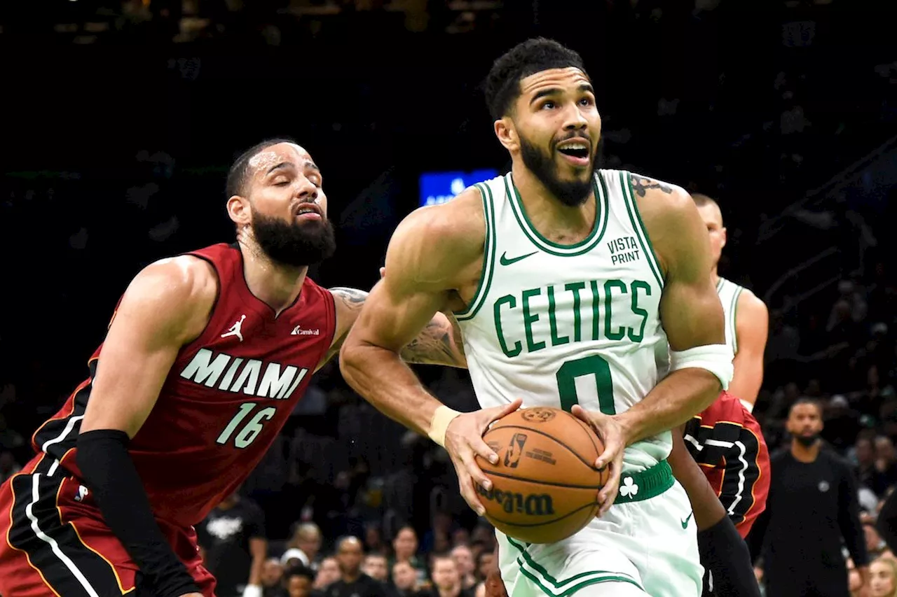 Tatum delivers triple-double as Celtics start fast, roll past Heat in Game 1 rout