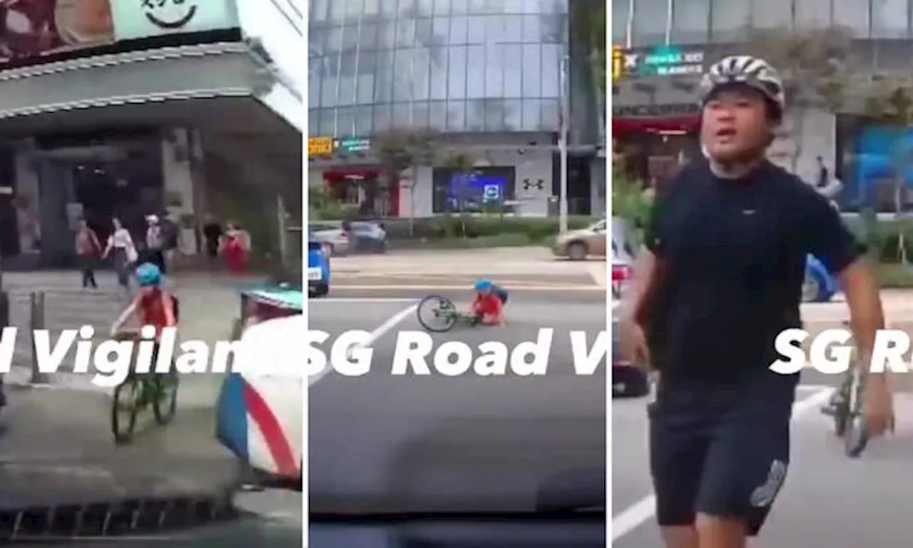 Cyclist scolds driver with vulgarity after child following him on bike crashes into car in Orchard