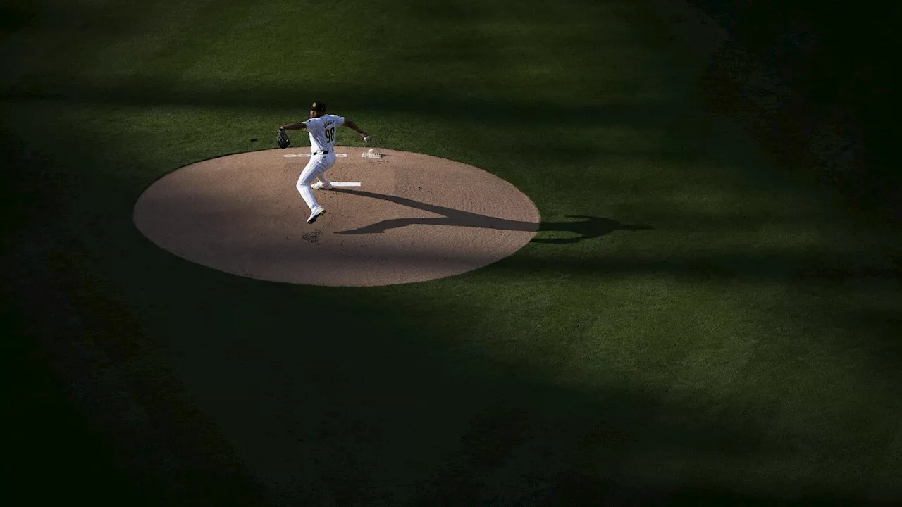 AP Sports Week in Pictures: Pitcher Randy Vazquez, Olympic flame lit and Nelly Korda's pond splash