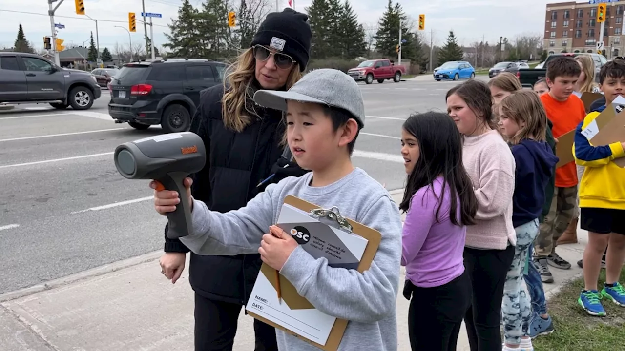 Not so fast! Grade 5 students get a firsthand lesson in speeding outside their school