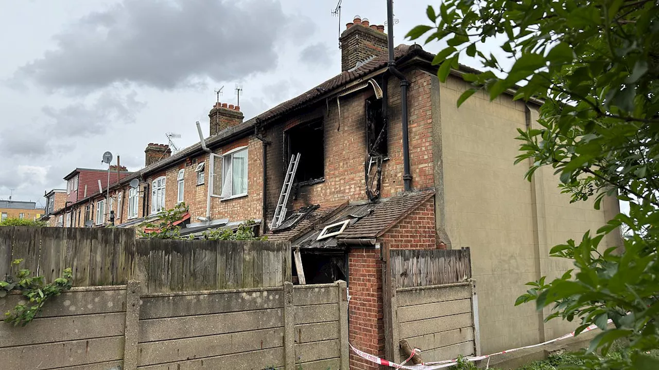 Murder investigation launched after two people died in house fire in north-east London: Police claim...