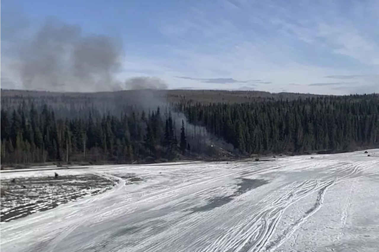 Douglas C-54 plane with 2 people on board crashes into river outside Fairbanks, Alaska