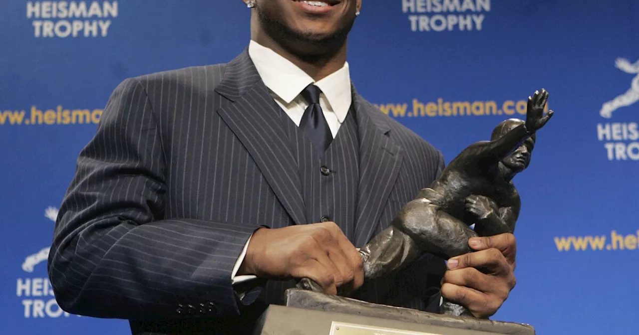 Former college football star Reggie Bush is reinstated as 2005 Heisman Trophy winner