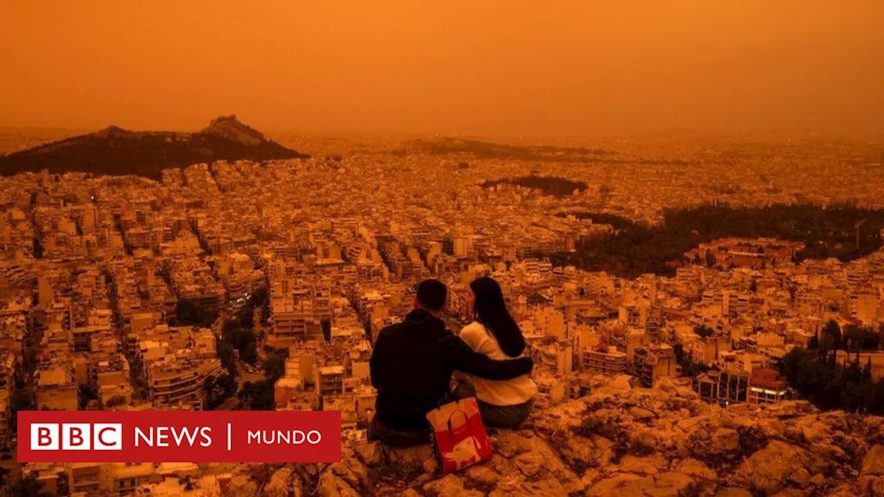 Atenas: La nube de polvo naranja del Sahara que creó impresionantes imágenes del cielo en la capital de Grecia