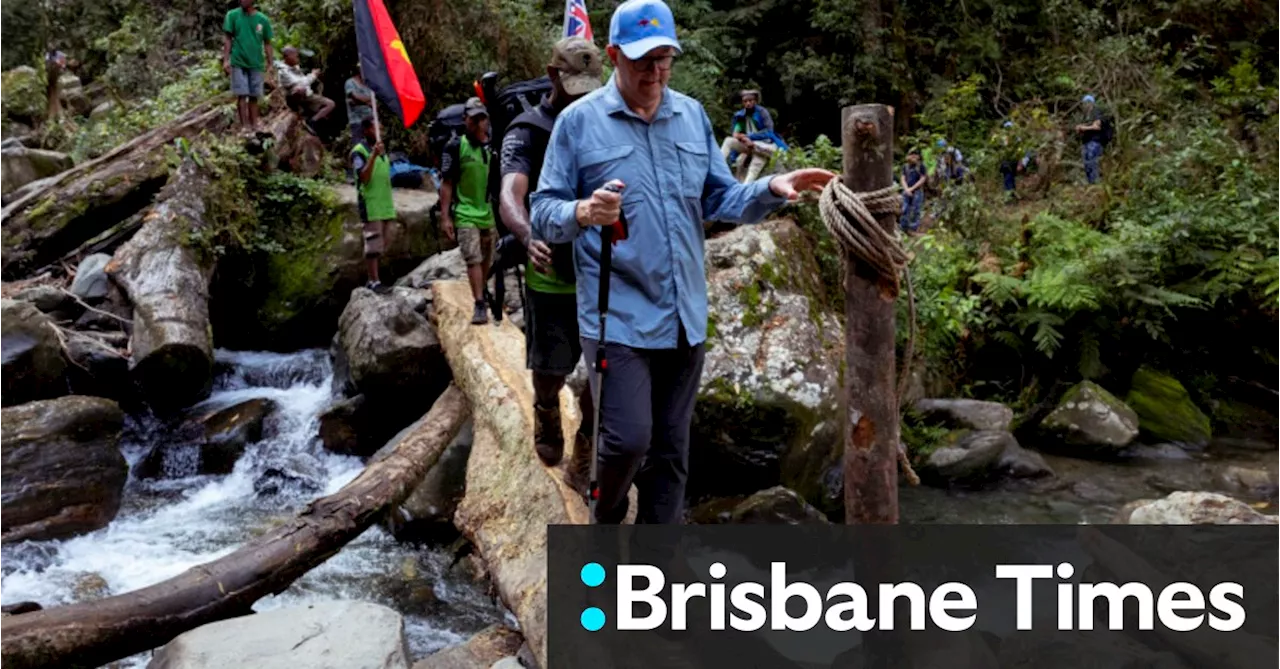 Mud, sweat and birthday cake for prime ministers on Kokoda’s hell climb to Isurava