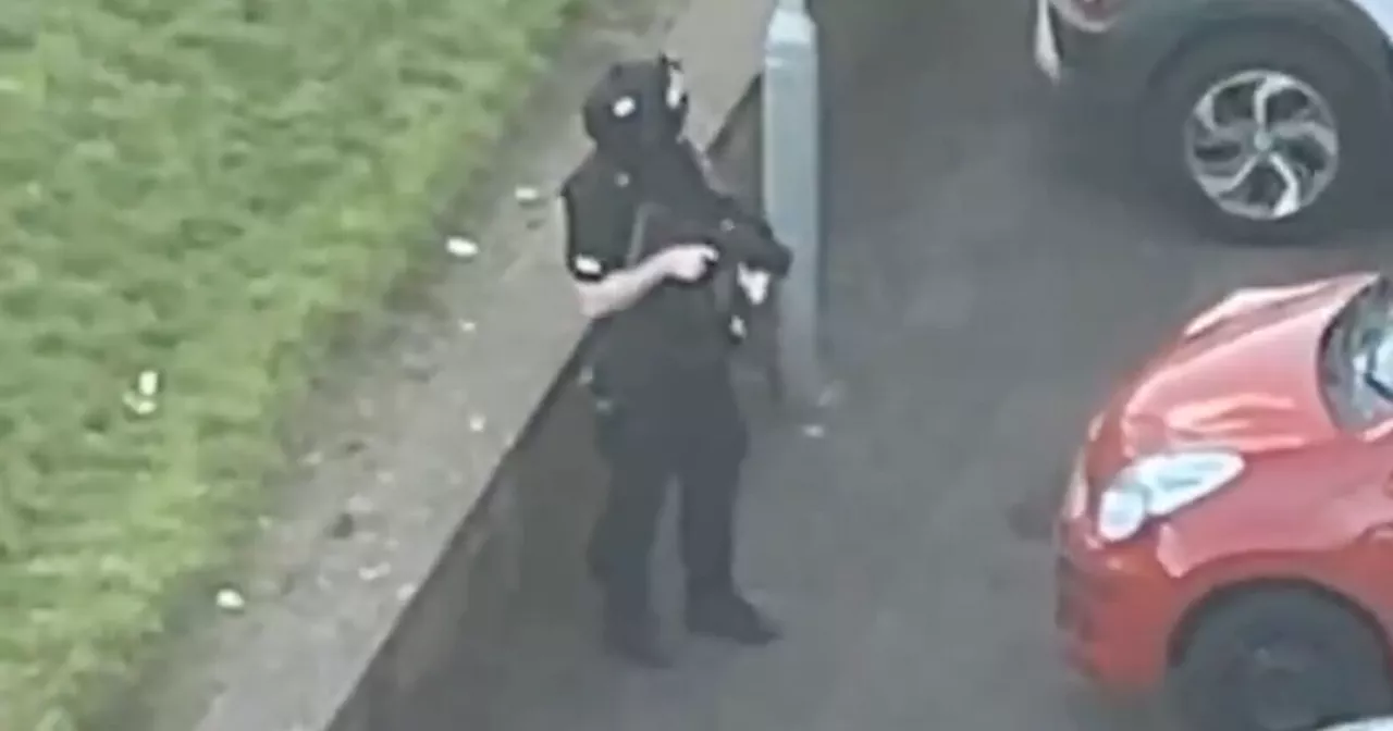 Armed cops swarm Glasgow high flats as man rushed to hospital following assault