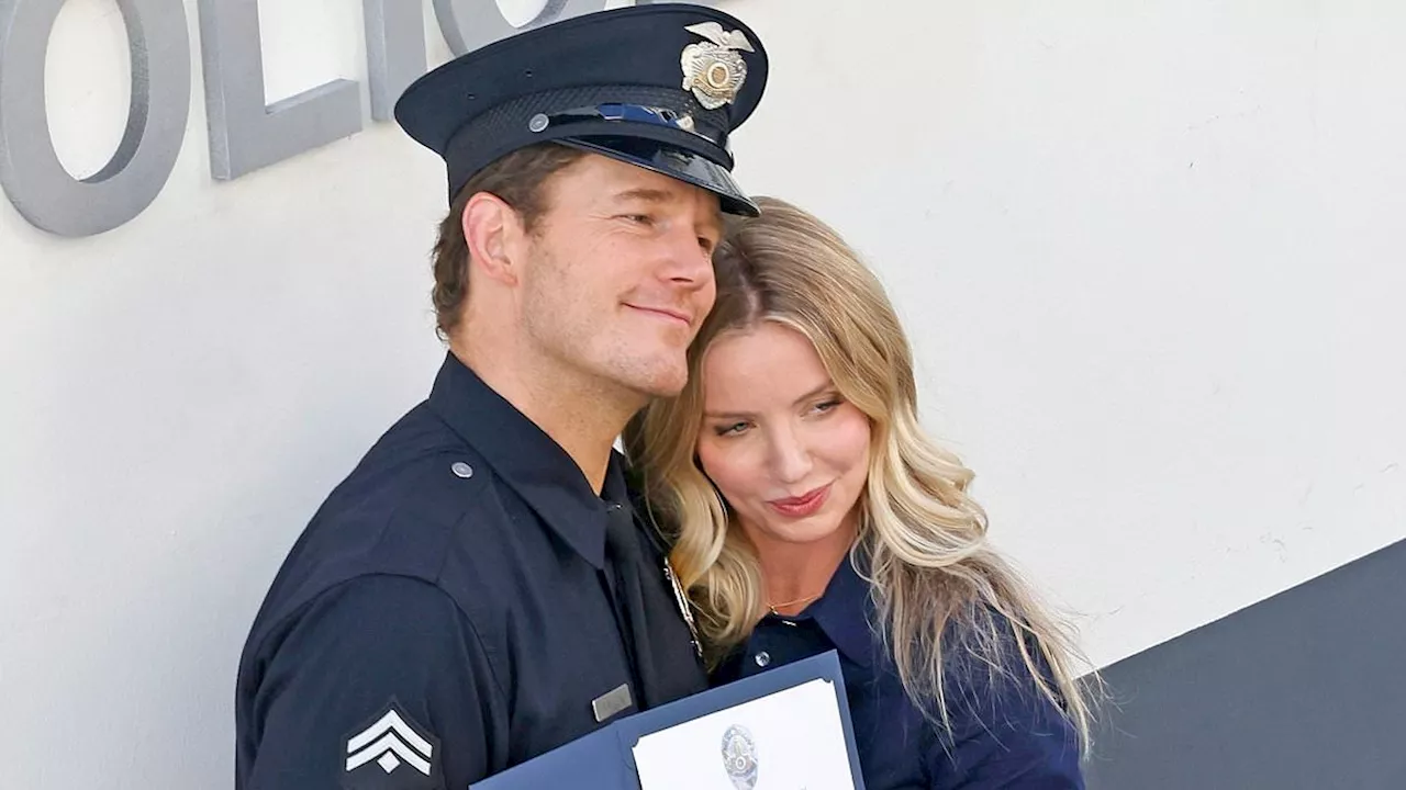 Chris Pratt and Annabelle Wallis pose as a married couple during a Police graduation ceremony as...