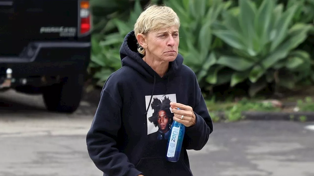 Ellen DeGeneres cuts a very casual figure as she drives around Montecito in her Ferrari... while...