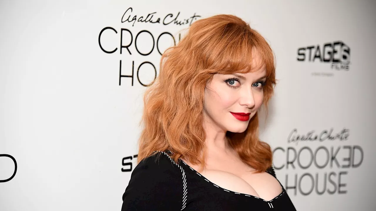 Christina Hendricks' hourglass figure looks phenomenal in stunning wedding weekend dress