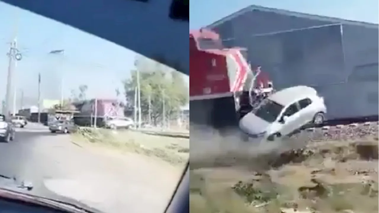 Video: Mujer no logra ganarle el paso al tren con su auto ¡Este fue el resultado!