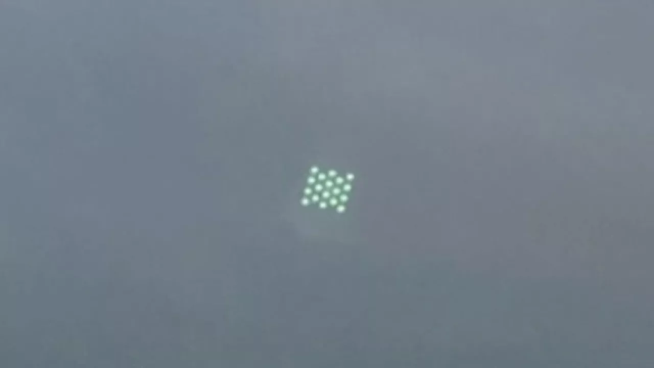 Eerie photo captures green ‘grid of dots’ floating in sky – but smart iPhone users worked out what’s really...