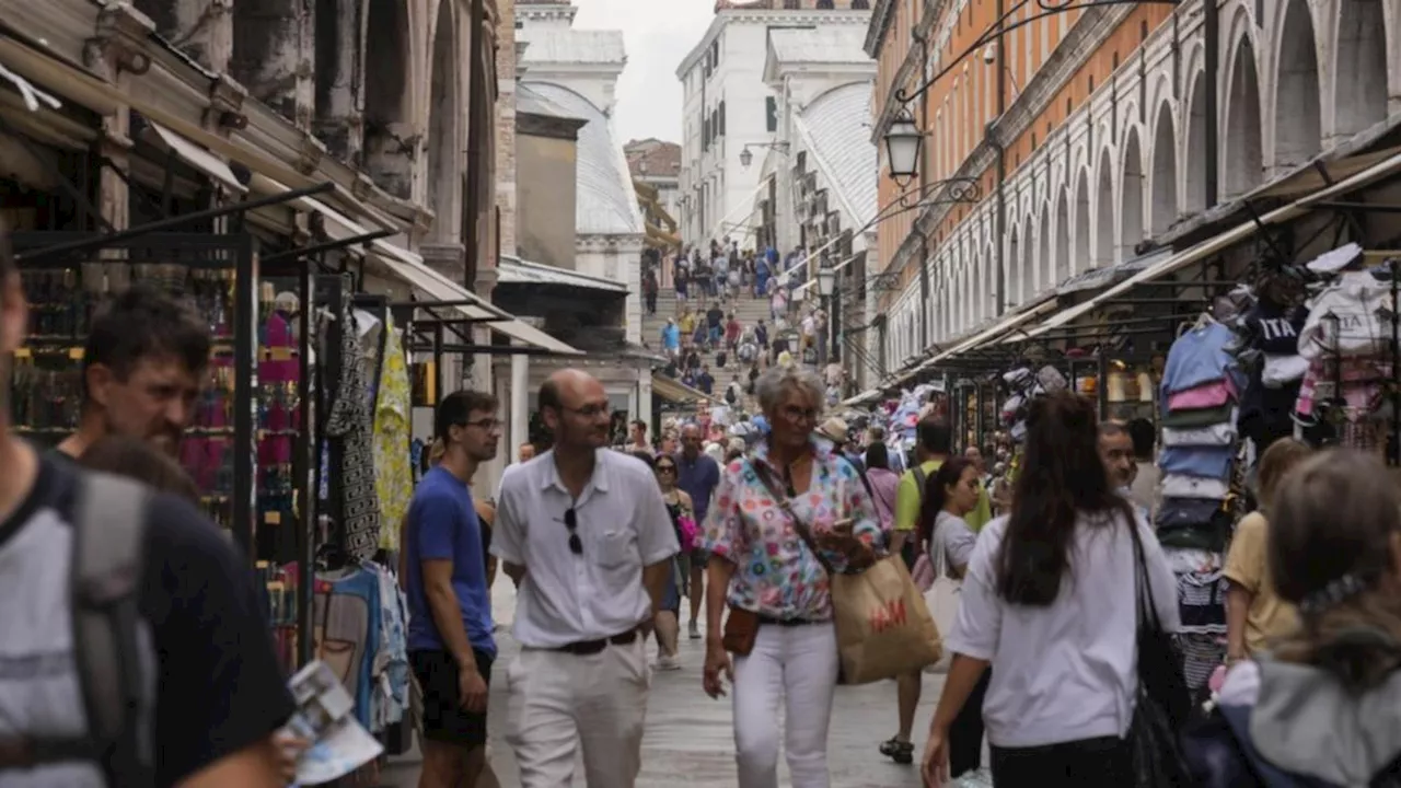 Venice begins trial of ticketing system for tourists to deter daytrippers at peak times