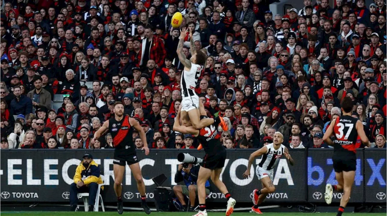 Collingwood star Jamie Elliott takes mark of the year front-runner on Anzac Day