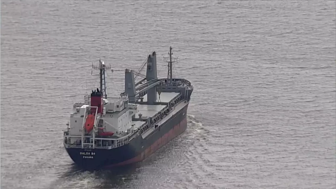 First cargo ship passes through newly opened channel in Baltimore since bridge collapse