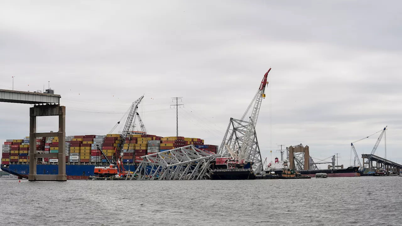 First cargo ship passes through newly opened channel in Baltimore since bridge collapse