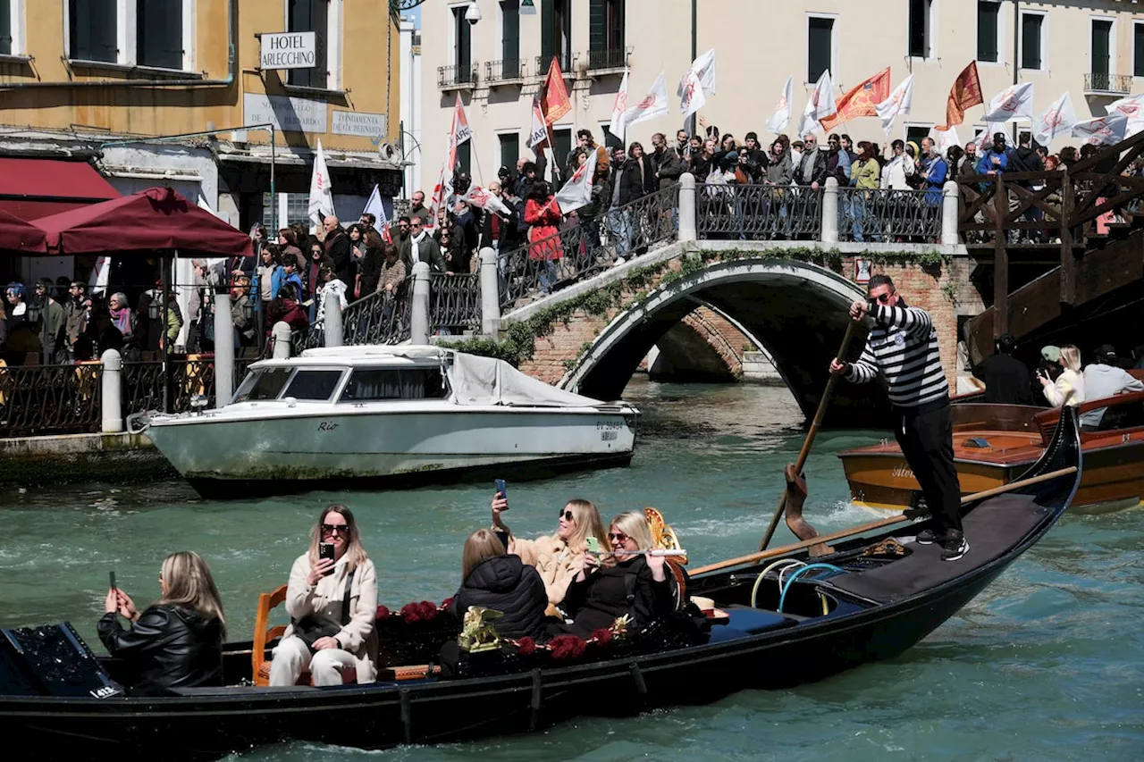 Overcrowded Venice begins charging day-trippers for access