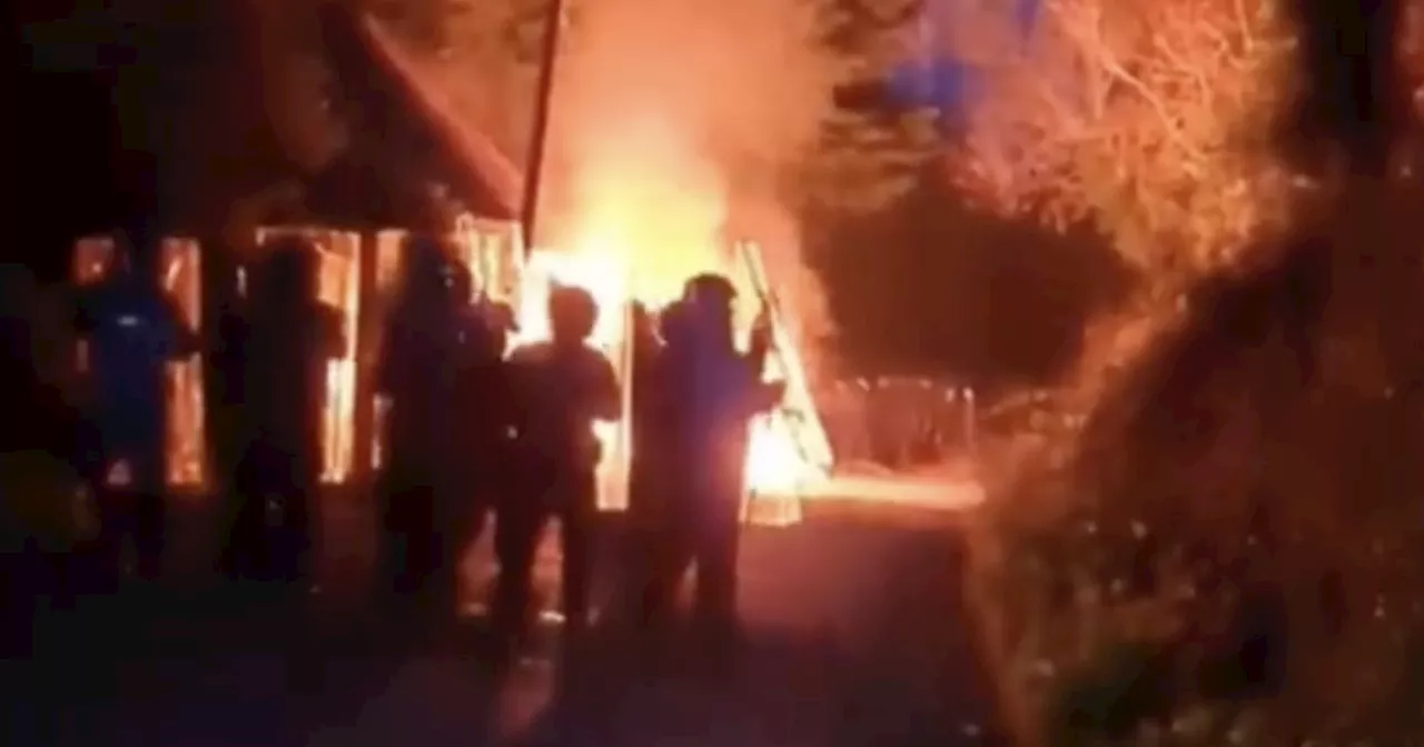 Six arrested as garda cars damaged and fires lit outside site set for refugees